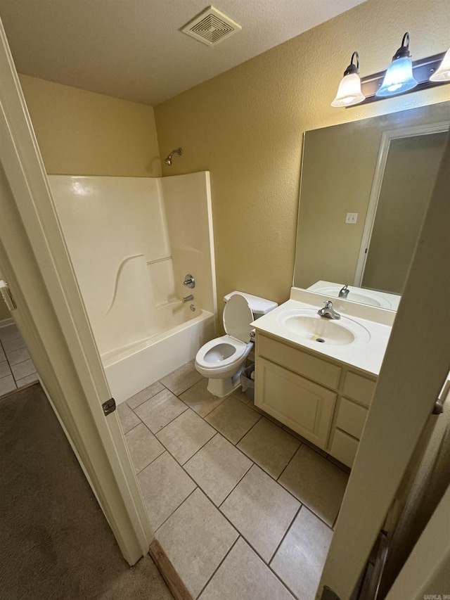 full bathroom featuring tile patterned flooring, vanity, shower / bathtub combination, and a textured wall