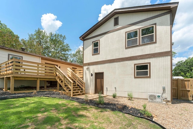 128 Dickson Dr, Little Rock, AR 72207 - rear view of house with a deck and stairway