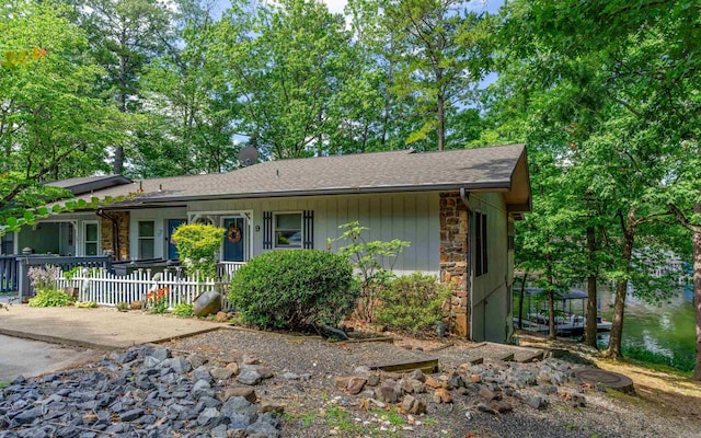 9 San Vincente Pl, Hot Springs Village, AR 71909 - single story home with stone siding and roof with shingles