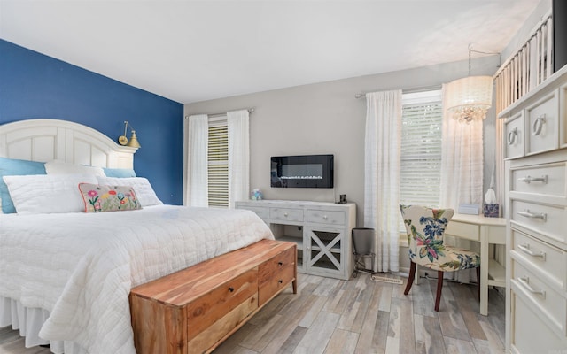 9 San Vincente Pl, Hot Springs Village, AR 71909 - bedroom with light wood-style flooring