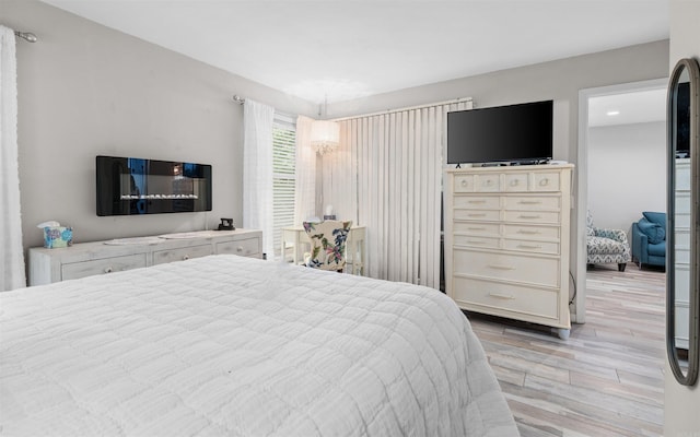 9 San Vincente Pl, Hot Springs Village, AR 71909 - bedroom featuring light wood-style flooring