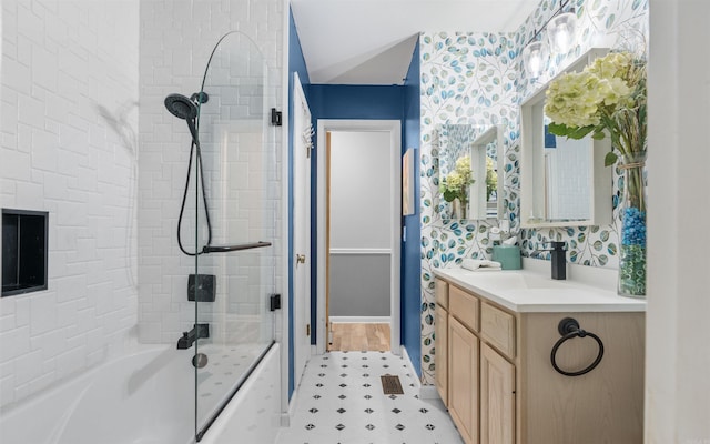 9 San Vincente Pl, Hot Springs Village, AR 71909 - full bath featuring vanity, washtub / shower combination, tile patterned floors, and lofted ceiling