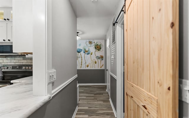 9 San Vincente Pl, Hot Springs Village, AR 71909 - hall with dark wood finished floors and baseboards