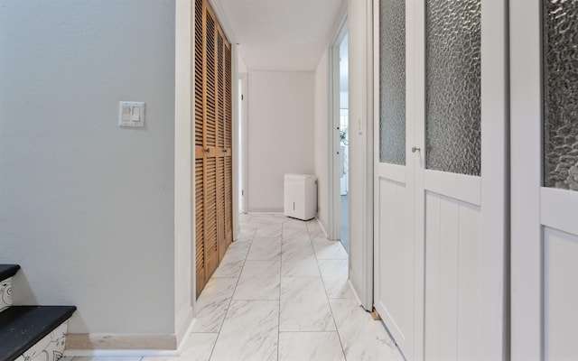 9 San Vincente Pl, Hot Springs Village, AR 71909 - hall featuring light marble finish floors