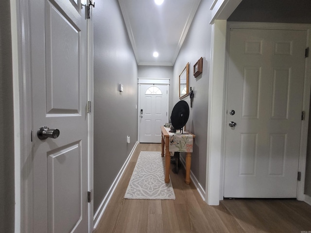 6413 Ram Rd, Mabelvale, AR 72103 - doorway to outside with ornamental molding and wood finished floors