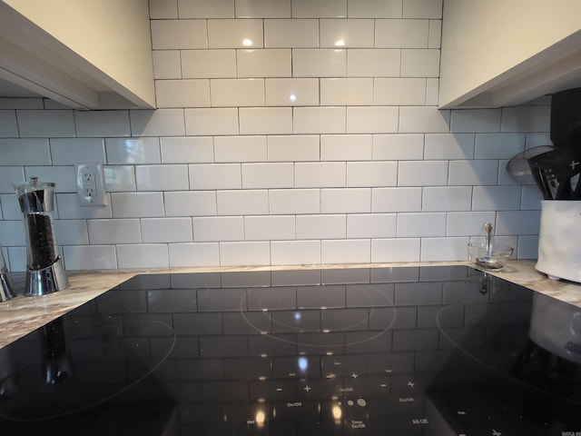 6413 Ram Rd, Mabelvale, AR 72103 - kitchen view of decorative backsplash and light stone countertops