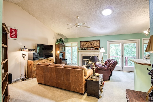 5 Lanza Ct, Hot Springs Village, AR 71909 - living room with a textured ceiling, light carpet, ceiling fan, healthy amount of natural light, and lofted ceiling