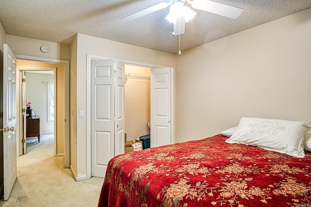 5 Lanza Ct, Hot Springs Village, AR 71909 - bedroom featuring light carpet, a textured ceiling, and a ceiling fan