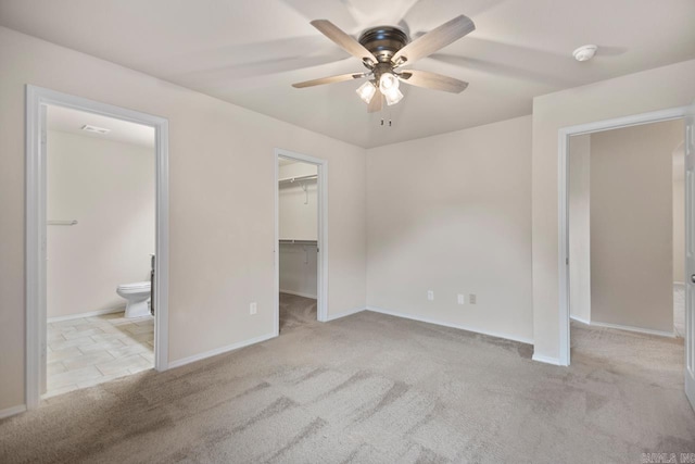 9701 Zuber, Alexander, AR 72002 - unfurnished bedroom with carpet flooring, a walk in closet, ensuite bath, a closet, and ceiling fan