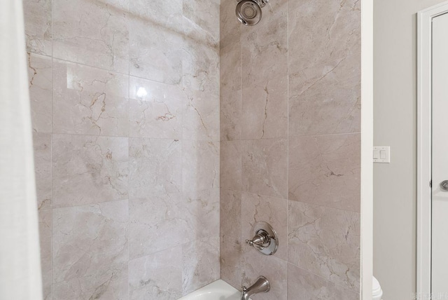 521 E President Clinton Ave Unit 1402, Little Rock, AR 72201 - bathroom view of tub / shower combination and toilet