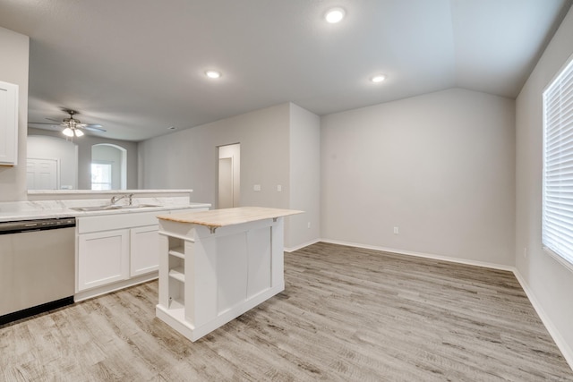 1375 Lacroix Ln, Conway, AR 72034 - kitchen with dishwasher, white cabinetry, light wood-style floors, vaulted ceiling, and arched walkways