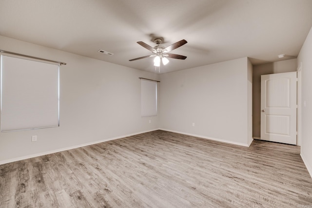 1375 Lacroix Ln, Conway, AR 72034 - empty room featuring wood finished floors and a ceiling fan