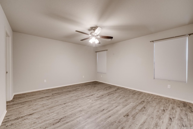 1375 Lacroix Ln, Conway, AR 72034 - empty room featuring wood finished floors and a ceiling fan