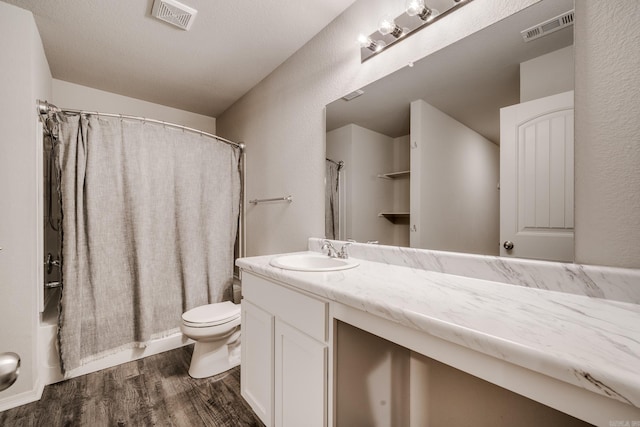 1375 Lacroix Ln, Conway, AR 72034 - bathroom with wood finished floors, vanity, and shower / bath combination with curtain
