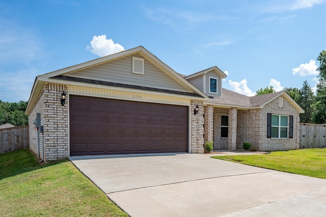1375 Lacroix Ln, Conway, AR 72034 - view of front of house featuring driveway, a garage, and brick siding
