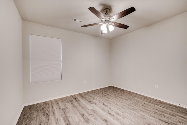 1375 Lacroix Ln, Conway, AR 72034 - empty room featuring wood finished floors and ceiling fan