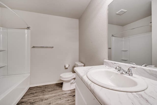 1375 Lacroix Ln, Conway, AR 72034 - bathroom with vanity, wood finished floors, and tub / shower combination