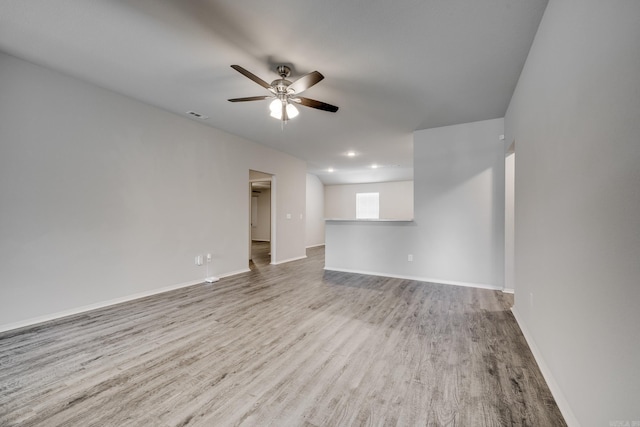 1375 Lacroix Ln, Conway, AR 72034 - unfurnished living room with ceiling fan, wood finished floors, and recessed lighting