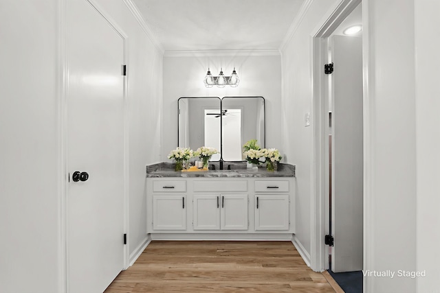 120 Whitewood Dr, Sherwood, AR 72120 - bar featuring crown molding and light wood-style flooring