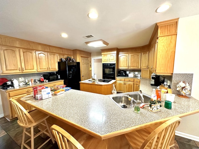 6823 Nevins Rd, Pine Bluff, AR 71603 - kitchen with black appliances, backsplash, a peninsula, a breakfast bar, and recessed lighting