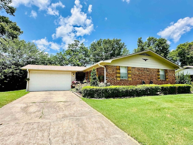 1912 W Arch Ave, Searcy, AR 72143 - ranch-style home with driveway, a front lawn, a garage, and brick siding