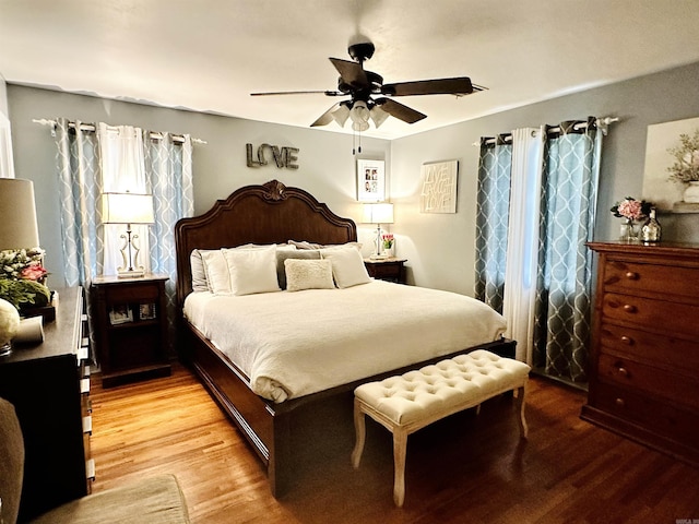 1912 W Arch Ave, Searcy, AR 72143 - bedroom featuring wood finished floors and ceiling fan