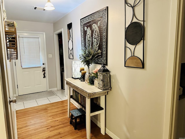 1912 W Arch Ave, Searcy, AR 72143 - entryway with light wood-style floors and baseboards