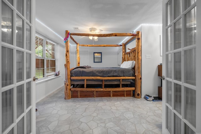 529 Charlie Stover, Royal, AR 71968 - bedroom with french doors and ceiling fan