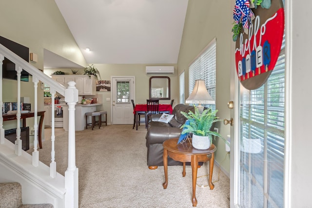 529 Charlie Stover, Royal, AR 71968 - living room with a wall mounted AC, light colored carpet, stairway, and high vaulted ceiling