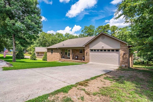 529 Charlie Stover, Royal, AR 71968 - single story home with an attached garage, concrete driveway, brick siding, and a front lawn