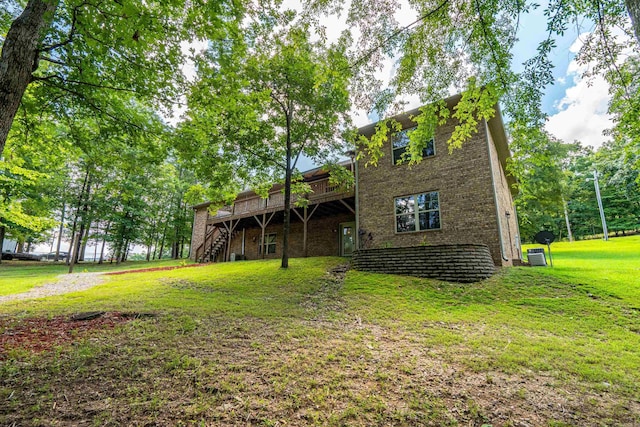 529 Charlie Stover, Royal, AR 71968 - back of house with stairway, a deck, a yard, and brick siding
