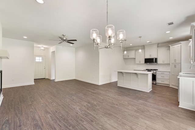85 Lewis Loop, Greenbrier, AR 72058 - kitchen featuring appliances with stainless steel finishes, a center island, recessed lighting, a ceiling fan, and open floor plan