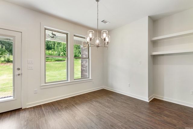 85 Lewis Loop, Greenbrier, AR 72058 - unfurnished dining area featuring dark wood-style floors and a chandelier