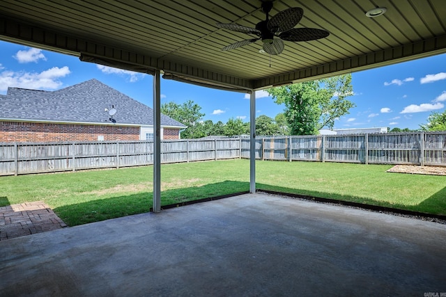 4116 Wildflower Ln, Benton, AR 72015 - fenced backyard with a patio area and a ceiling fan