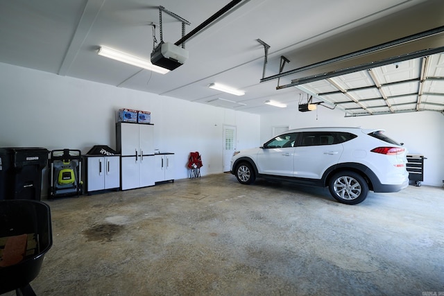 4116 Wildflower Ln, Benton, AR 72015 - garage featuring a garage door opener