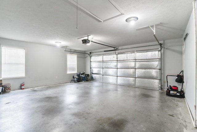 2225 Caleb Dr, Searcy, AR 72143 - garage featuring a garage door opener
