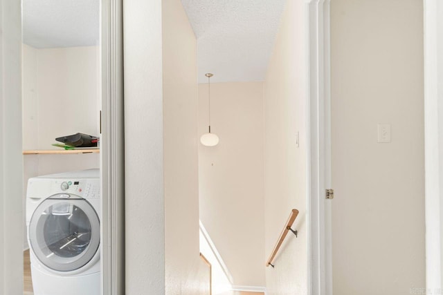154 La Vista Ln, Hot Springs Village, AR 71909 - laundry area featuring washer / dryer and a textured ceiling