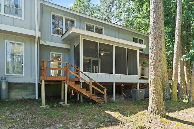 154 La Vista Ln, Hot Springs Village, AR 71909 - back of house featuring a sunroom and stairs