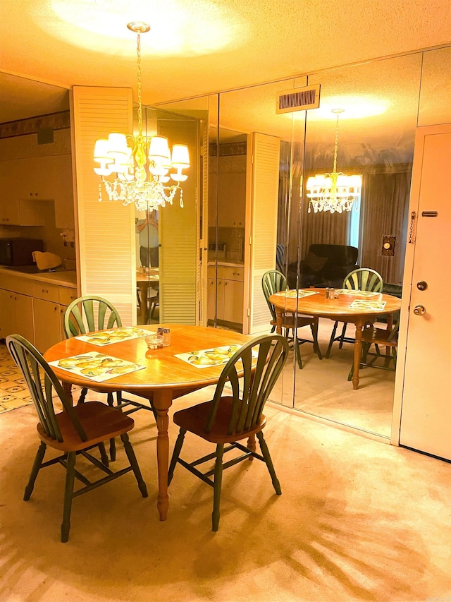 700 E 9th St Unit 6L, Little Rock, AR 72202 - dining room with a chandelier