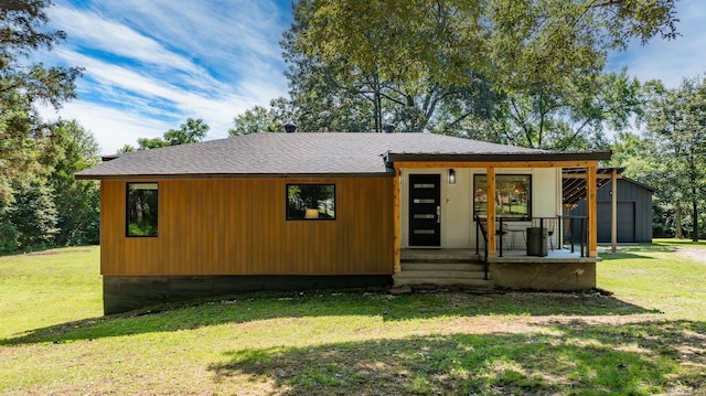 7616 Samples Rd, Benton, AR 72019 - modern home featuring a porch, a front yard, and roof with shingles