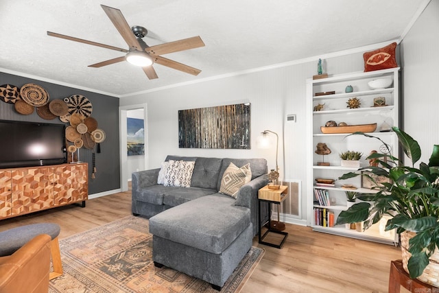 7616 Samples Rd, Benton, AR 72019 - living area featuring wood finished floors, a ceiling fan, and ornamental molding