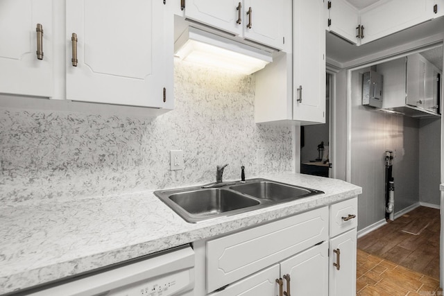 7616 Samples Rd, Benton, AR 72019 - kitchen featuring white dishwasher, light countertops, and white cabinetry