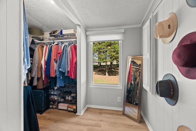 7616 Samples Rd, Benton, AR 72019 - spacious closet with wood finished floors