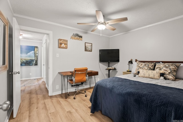 7616 Samples Rd, Benton, AR 72019 - bedroom featuring light wood-style floors, crown molding, a textured ceiling, and ceiling fan