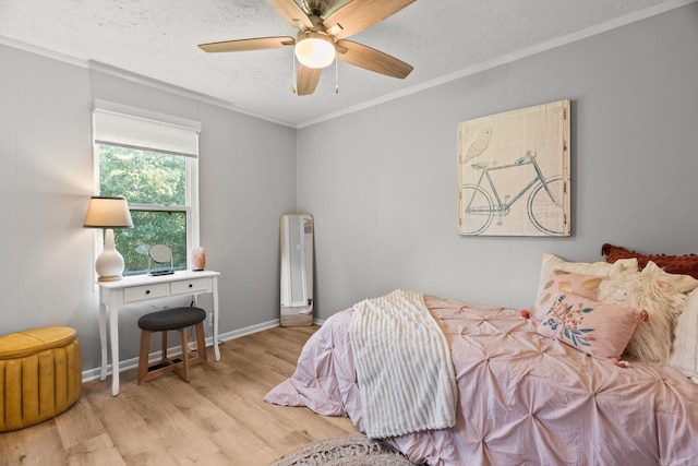 7616 Samples Rd, Benton, AR 72019 - bedroom with wood finished floors, a textured ceiling, crown molding, and a ceiling fan