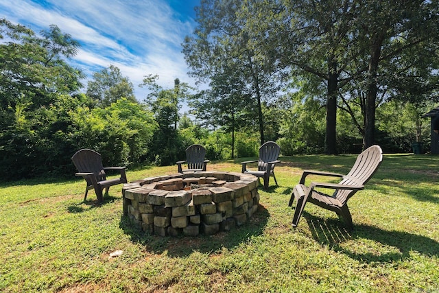 7616 Samples Rd, Benton, AR 72019 - view of grassy yard with an outdoor fire pit