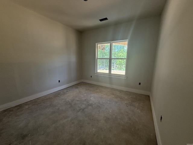 6960 Christine Ln, Benton, AR 72019 - spare room with unfinished concrete flooring and baseboards
