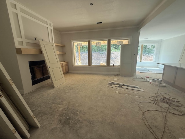 6960 Christine Ln, Benton, AR 72019 - unfurnished living room with a fireplace and ornamental molding