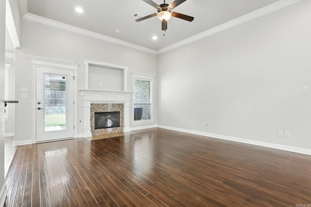 6137 Remington Dr, Bryant, AR 72022 - unfurnished living room with healthy amount of natural light, dark wood-type flooring, ceiling fan, ornamental molding, and recessed lighting