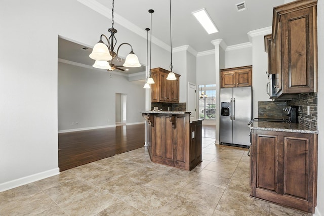 6137 Remington Dr, Bryant, AR 72022 - kitchen featuring stainless steel fridge with ice dispenser, ornamental molding, decorative backsplash, a chandelier, and pendant lighting